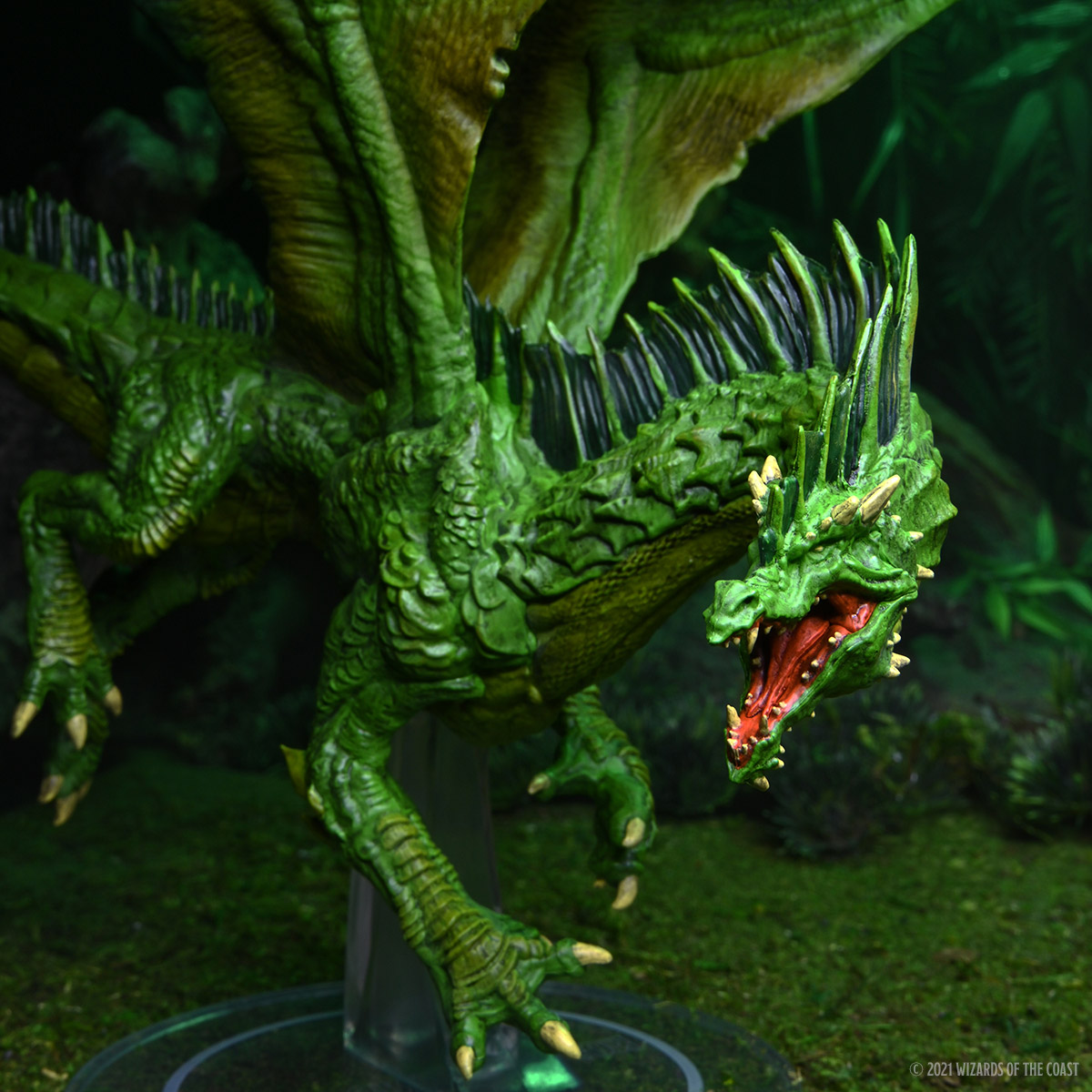 her interactive green dragon statue hands